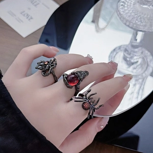 Gothic spider rings in black plated alloy with ruby red zircon stones details
