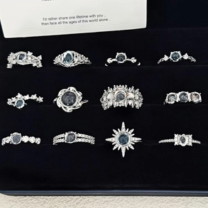 Set of 12 vintage silver rings with moonlight stones and sparkling zircon details