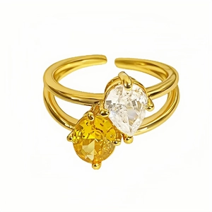 Verstellbarer goldener offener Ring mit birnenförmigem Stein und gelbem ovalem Zirkon