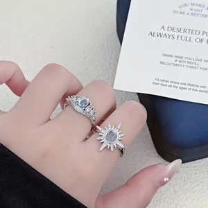 Close-up of S925 silver moonstone rings with sunflower and vintage hollow designs
