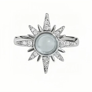 Elegant silver open ring with sunburst moonstone and sparkling cubic zirconia stones