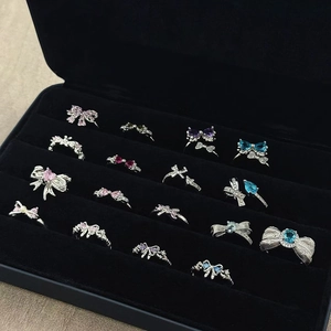 Luxe crystal bow tie open rings set with colorful zircons in a premium jewelry box