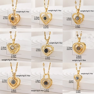 Detailed grid of gold heart and lock necklaces with stone projection and size specs