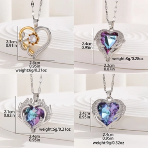 Detailed views of heart necklaces with crystal wings and specific product dimensions