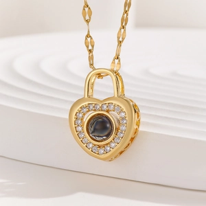 Golden heart-shaped lock necklace with 100 languages projection stone and zircon inlay