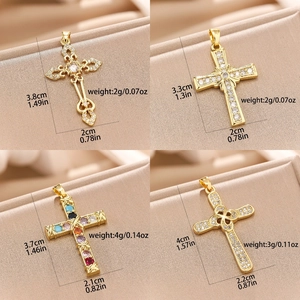 Detailed size and weight specs for golden cross pendants with cubic zirconia inlay