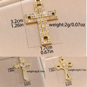 Detailed comparison of three gold cross pendants with cubic zirconia inlay and sizes