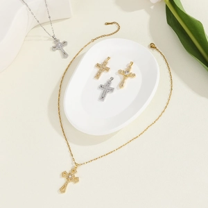 Detailed view of religious cross necklaces with micro-paved cubic zirconia stones