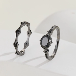 Luxe black plated two-piece ring set with oval black zircon in a geometric setting