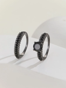 Detailed macro view of two-piece black zircon wheat ear rings with gunmetal finish