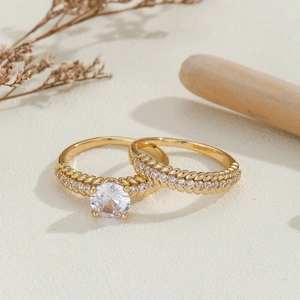 Luxury gold copper ring set with round zircon stones and vintage twisted band texture