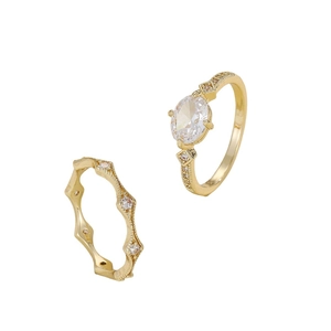 Luxurious gold-plated copper rings with oval zircon and diamond-studded wave band