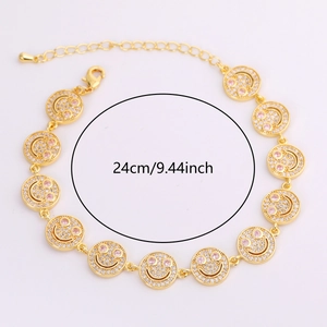 Vintage gold smiley face bracelet with white zircon and pink gem eyes, 24cm adjustable length