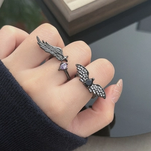 Gothic black metal wing rings with purple heart zircon and black teardrop stones