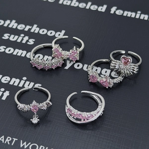 Set di 6 anelli regolabili color argento con fiocchi in zircone rosa e cuori fini