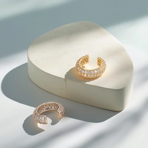 French geometric pleated ear cuffs with micro-pave crystals in gold and rose gold
