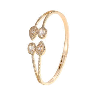 Elegant gold-plated bangle with sparkling water drop and oval zircon crystals