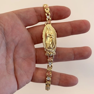 Three-tone gold Virgin of Guadalupe bracelet with floral links and embossed religious medal