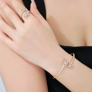 Elegant gold geometric open bracelet and ring set with cubic zirconia stones for women