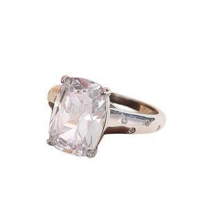 Modern silver square zirconia ring featuring a wide band and minimalist rectangle crystal