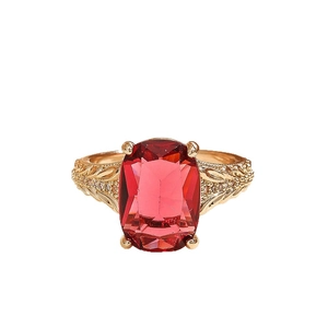 Elegant gold crown ring with a rectangular ruby gemstone and ornate leaf carvings