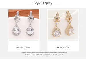 Confronto dettagliato di orecchini a goccia in finiture oro 18K e platino lucido