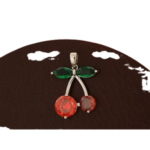 Charming silver cherry pendant necklace with vibrant red and green faceted gemstones