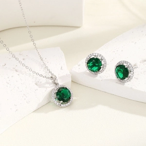 Sparkling zircon jewelry set with green gemstones including necklace and stud earrings