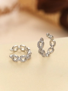 Close-up of silver Cuban link ear cuffs with micro-pave white zircon stones for women