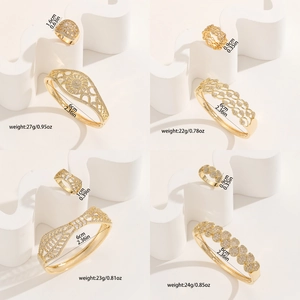 Luxurious gold hollow patterned jewelry sets with zircon-encrusted bangle and ring