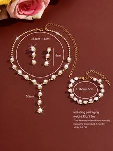 Detail of sunflower pearl bridal set showing necklace, earrings, and bracelet measurements
