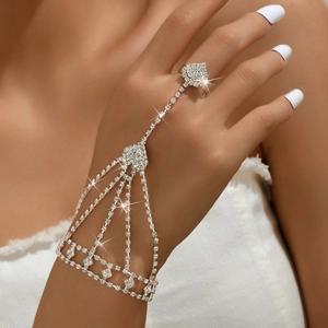Sparkling silver hand chain ring with rhinestones for elegant evening and party wear