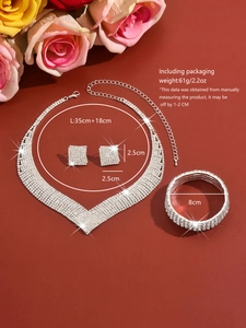 Detailed view of luxury silver V-shape necklace and square earrings set for bridal wedding