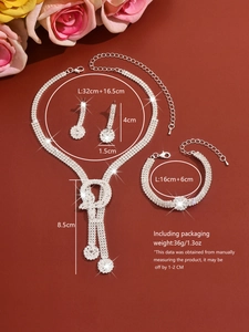 Detailed view of shiny silver rhinestone bridal jewelry set with dimensions labels