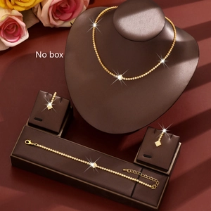Elegant rhinestone jewelry set with necklace bracelet and earrings in golden finish
