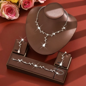 Elegant leaf zircon jewelry set with silver necklace, bracelet, and drop earrings