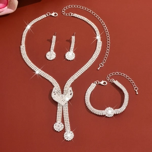 Detailed view of bridal crystal jewelry set with Y-necklace, bracelet and earrings