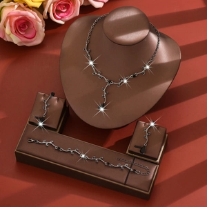 Elegant black leaf zircon jewelry set featuring vine necklace bracelet and earrings