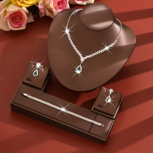 French vintage full diamond jewelry set with green teardrop pendants and crystals