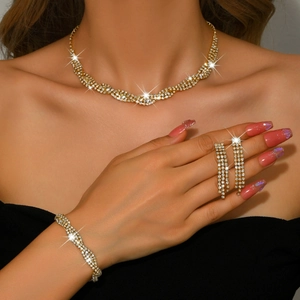 Elegant gold bridal jewelry set with sparkling rhinestones necklace bracelet and earrings
