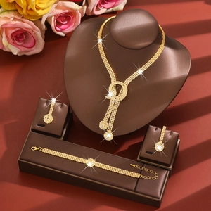 Exquisite bridal jewelry set macro view with sparkling crystals on elegant brown leather stand