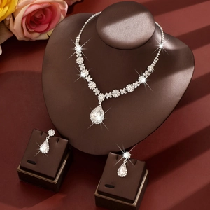 Detail of bridal jewelry set with pear-shaped rhinestones on professional display stand