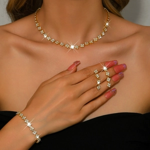Sparkling gold clover jewelry set with crystal necklace, bracelet and earrings for women