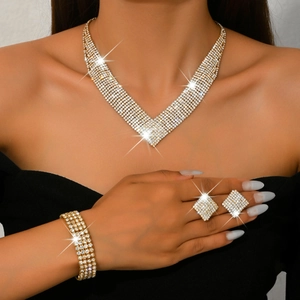 Luxury V-shaped rhinestone bridal jewelry set with necklace, bracelet and earrings