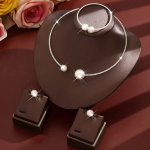 French style pearl and rhinestone jewelry set featuring necklace, bracelet and earrings