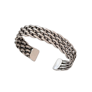 Vintage braided silver cuff bracelet with intricate ethnic woven design and open C-shape