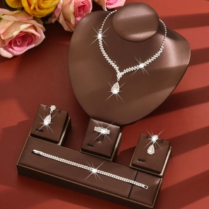 Elegant silver-tone water drop jewelry set with necklace earrings bracelet and ring
