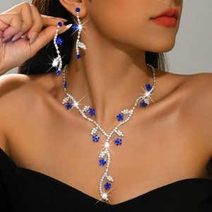 Exquisite bridal jewelry set with navy blue floral rhinestones on necklace and earrings