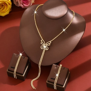 Elegant gold butterfly jewelry set with sparkling rhinestones and delicate tassels
