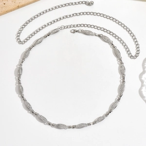 Elegant silver thin waist chain featuring oval geometric links with sparkling rhinestones